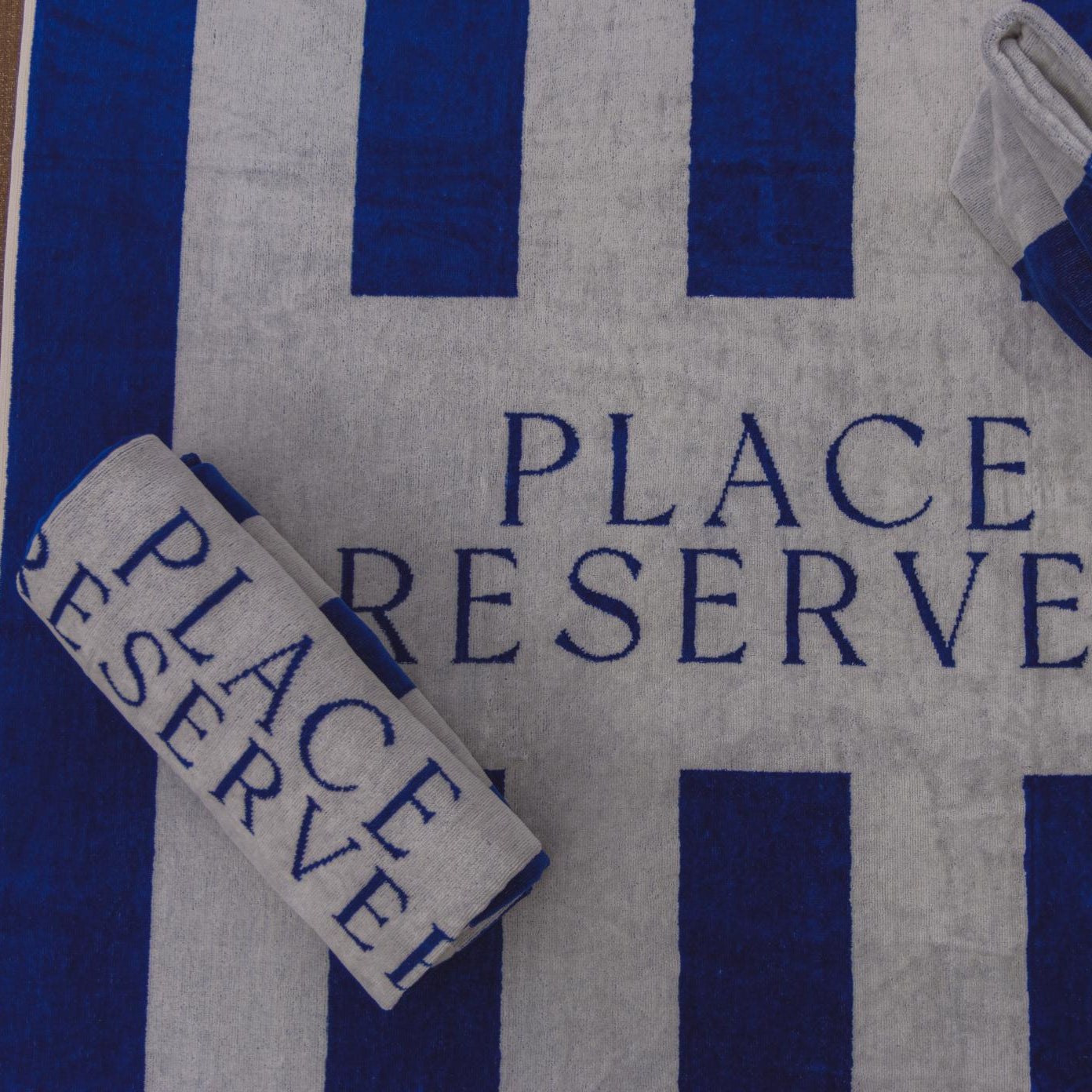 Strandhandtuch "PLACE RESERVEE" - 100x200cm